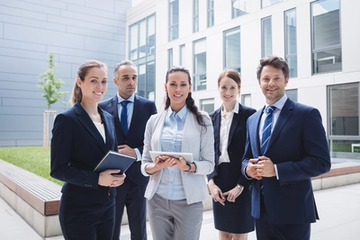 Business People Standing Outside an Office Building